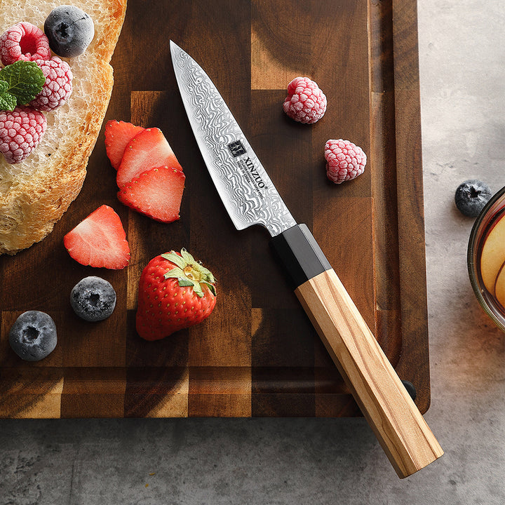 XinZuo PM8O Zhen schilmes op snijplank met fruit en brood