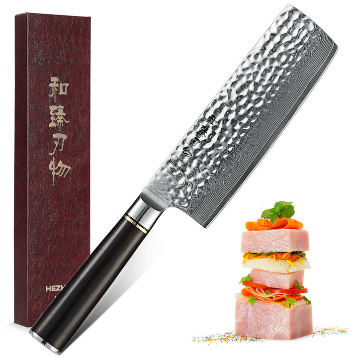 Hezhen B1Z Classic nakiri naast een schotel met vis, naast de doos