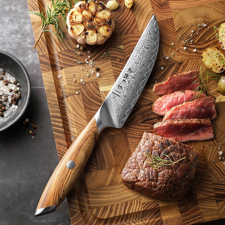 Hezhen X01 Flagship steakmes met vlees en groenten op snijplank
