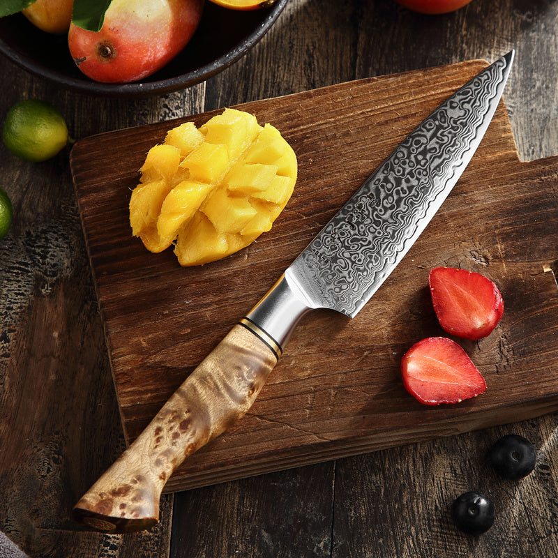 Hezhen B30 Master koksmes snijdt mango op plank