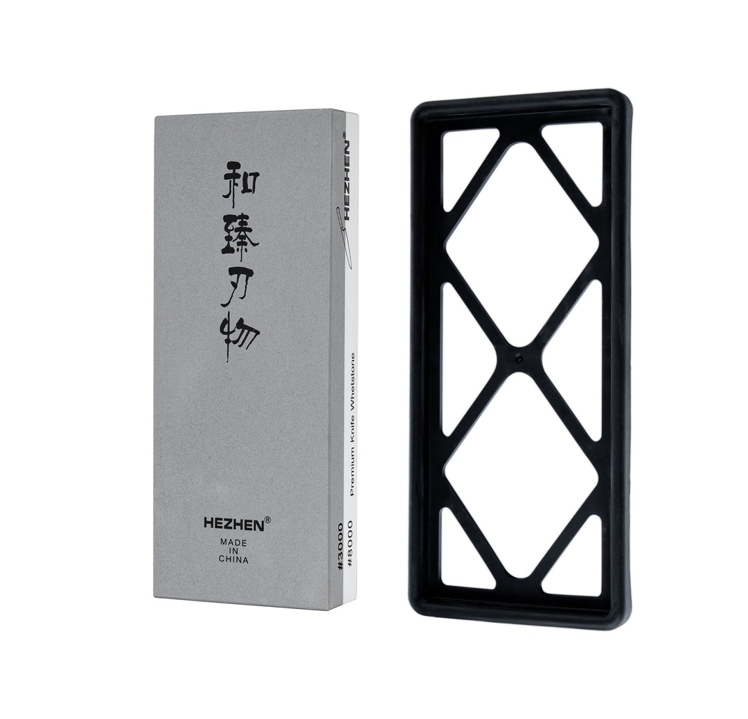 Slijpsteen 20×8 cm naast doos met Chinese karakters