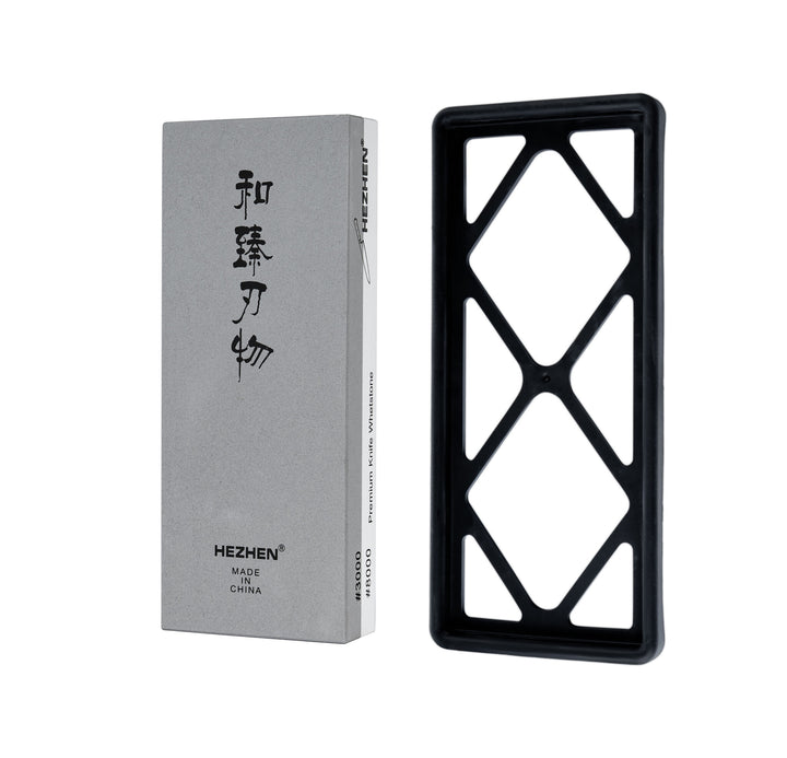Slijpsteen 20×8 cm naast doos met Chinese karakters