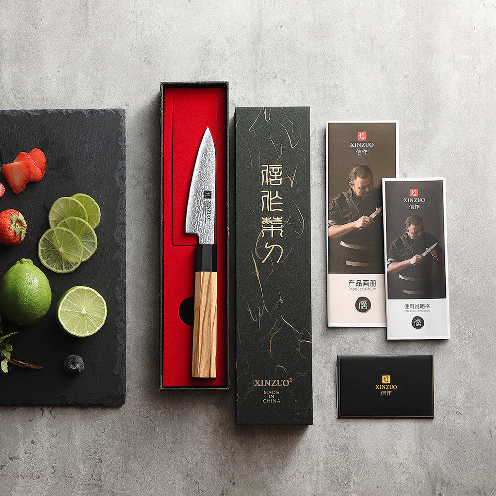 XinZuo PM8O Zhen schilmes naast limoen en citroen in de geschenkdoos