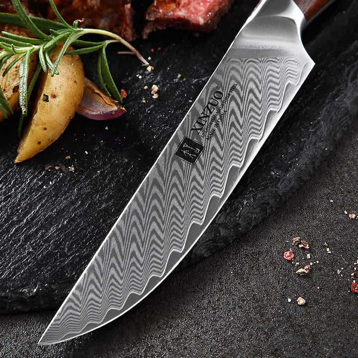 Lemmet van XinZuo B27 Yi steakmes met vlees en aardappelen