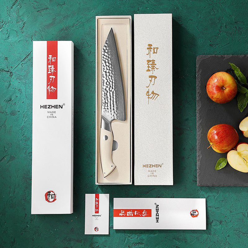 Hezhen B38H Elegant koksmes naast appels en snijplank