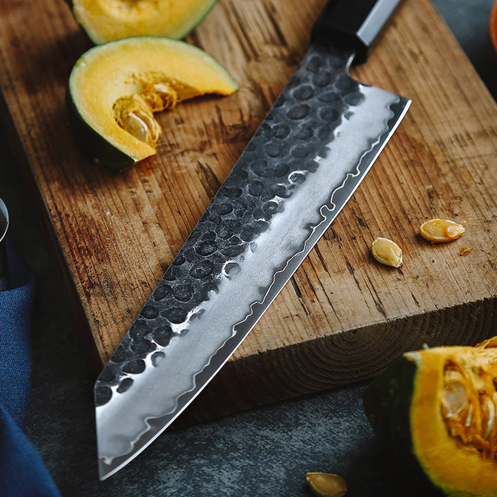 Lemmet van Hezhen PM8S Retro koksmes met pompoen op achtergrond