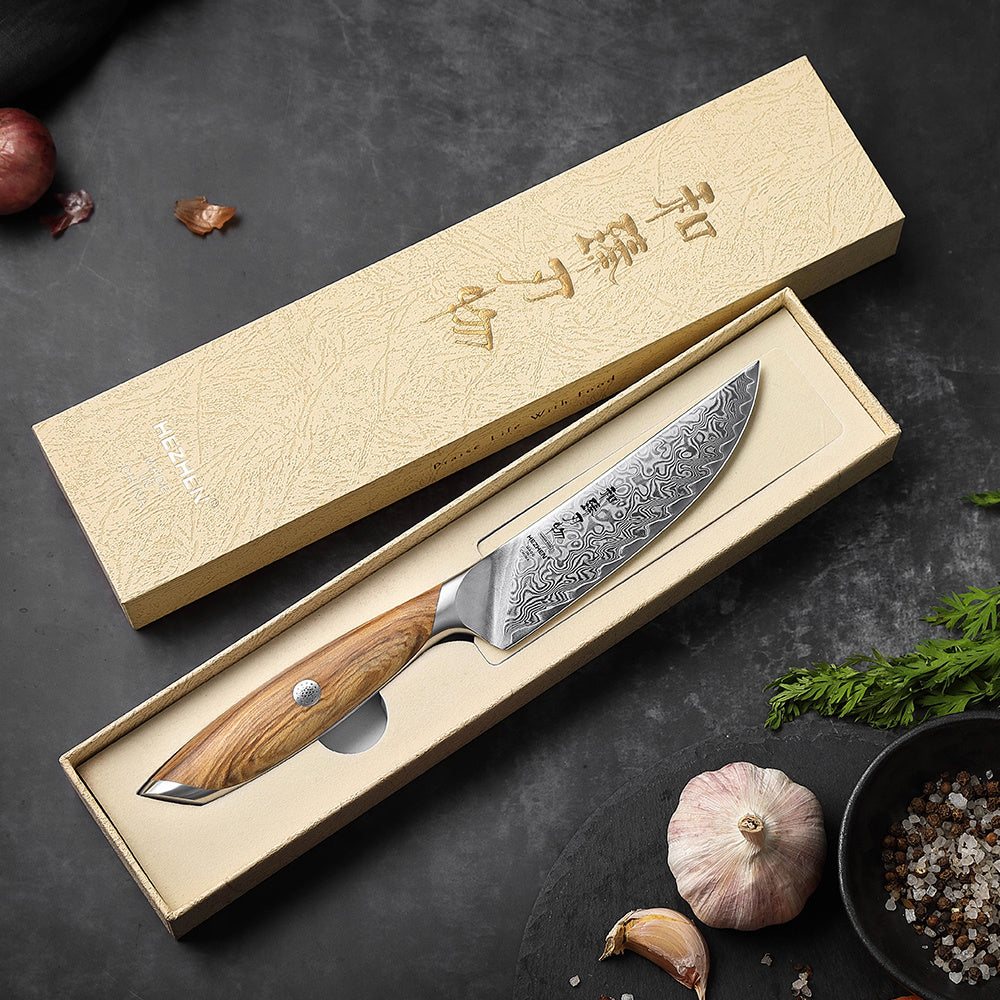 Hezhen X01 Flagship steakmes naast de doos