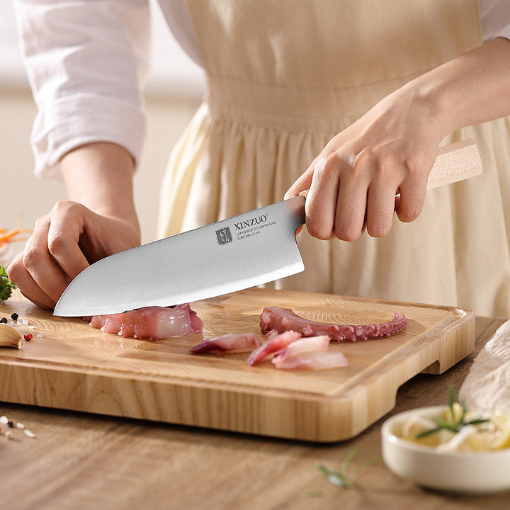 PM8M Zhen santokumes snijdt vlees op snijplank