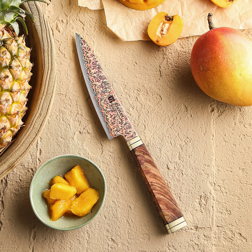 XinZuo X08C Ji groentemes naast gesneden fruit en mango
