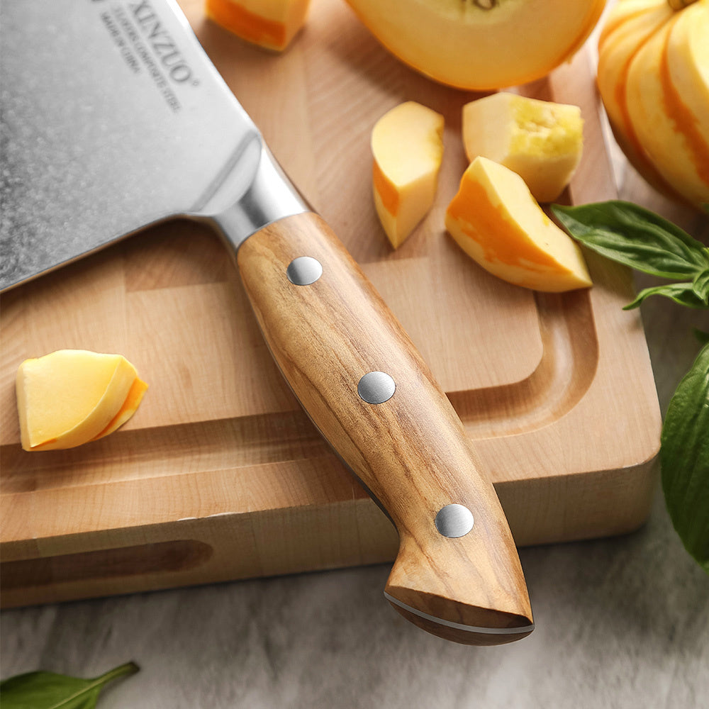 Houten handvat van de X02O Pin cleaver met klinknagels