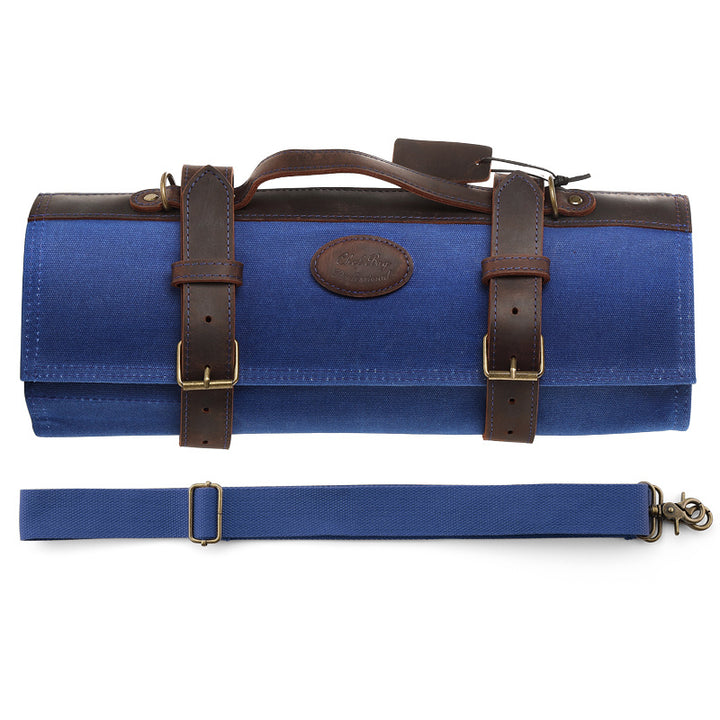 Blauwe messentas van canvas en leer met handvat en schouderband