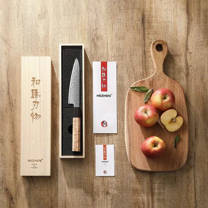 Hezhen PM8B Retro groentemes naast appels en snijplank in de doos