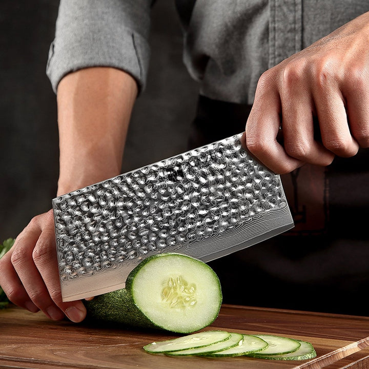 XinZuo B13D Yu Chinese cleaver snijdt een komkommer