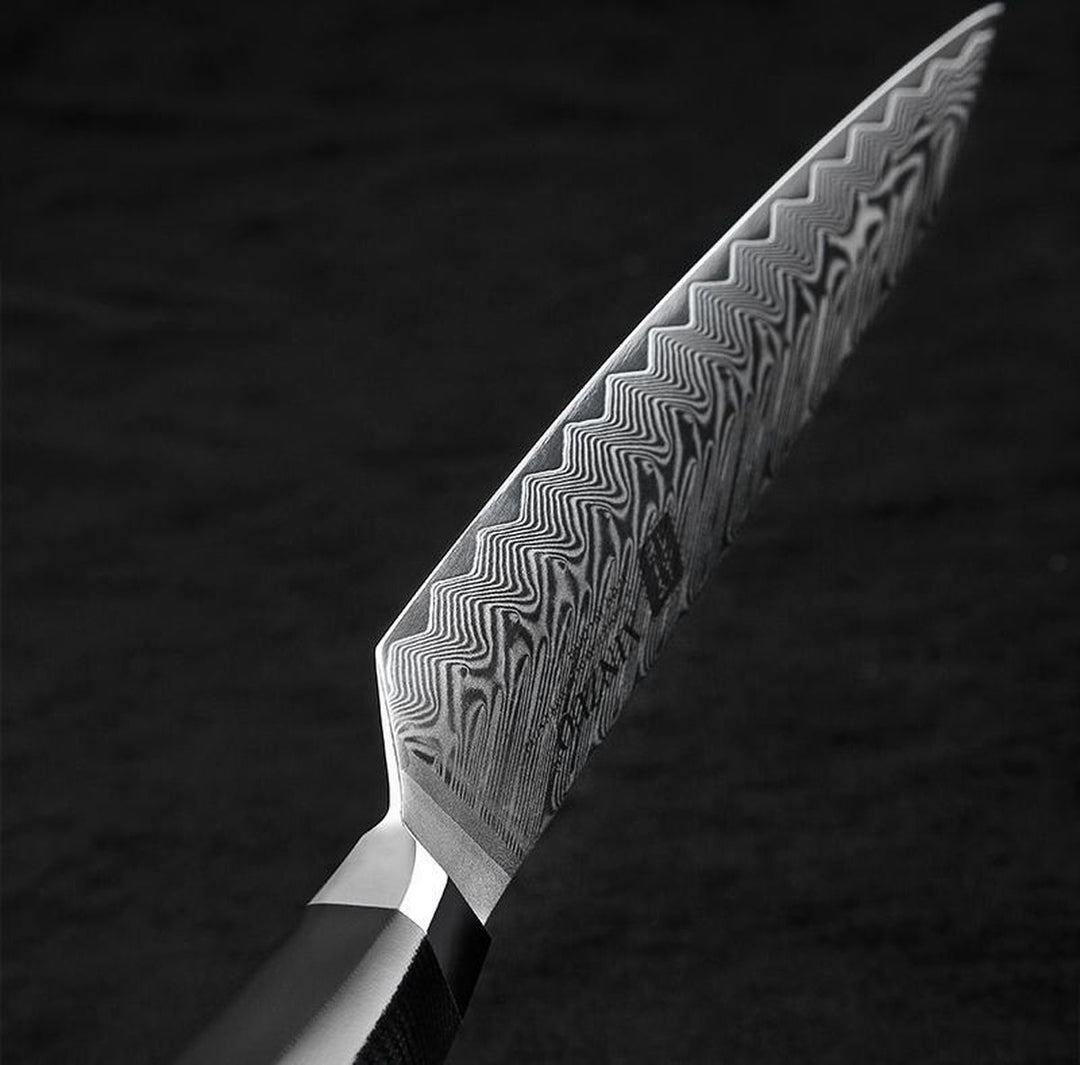Damascus lemmet van het B32 Feng vleesmes, zijaanzicht